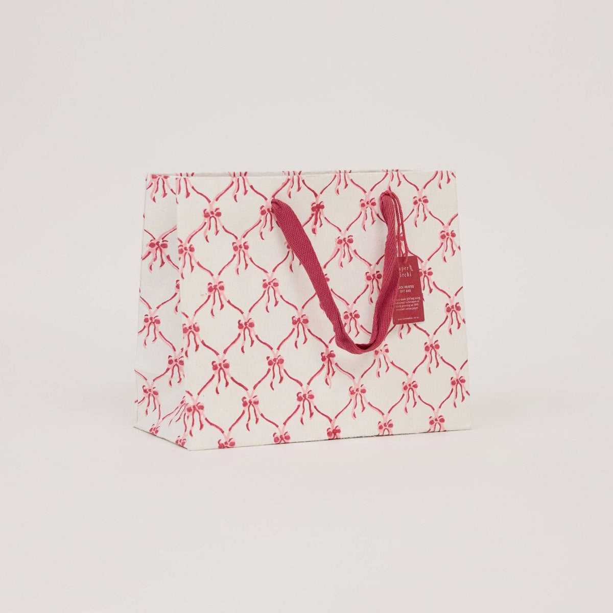 Block printed gift bag in Bows Christmas Pudding pattern, Medium size